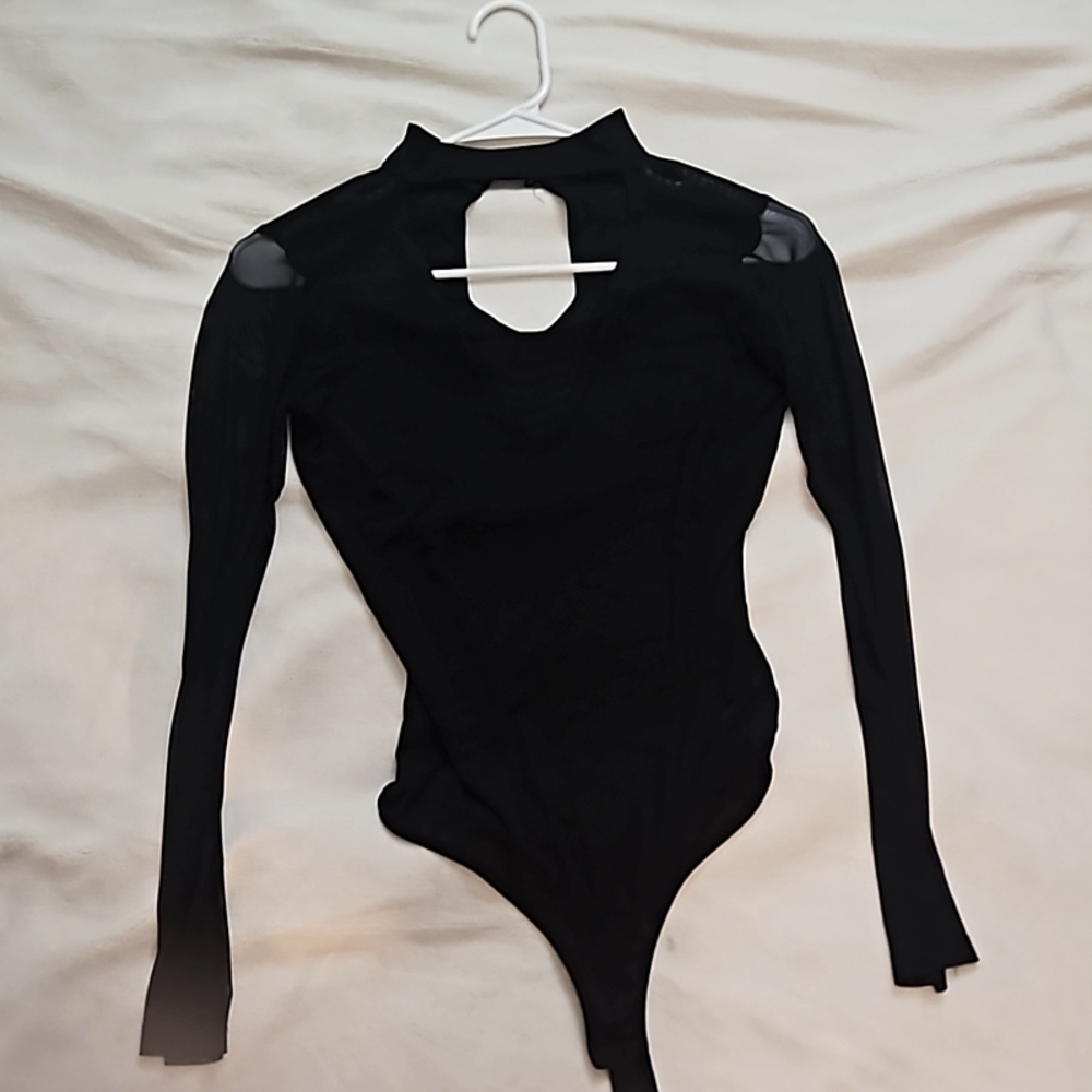 Black body suit. Made by bebe size small